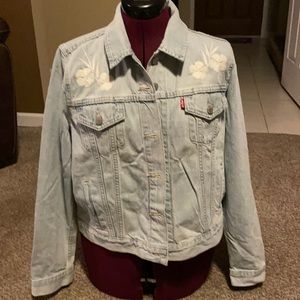 Woman’s Levi’s Jean jacket  flower embroidered size extra large
